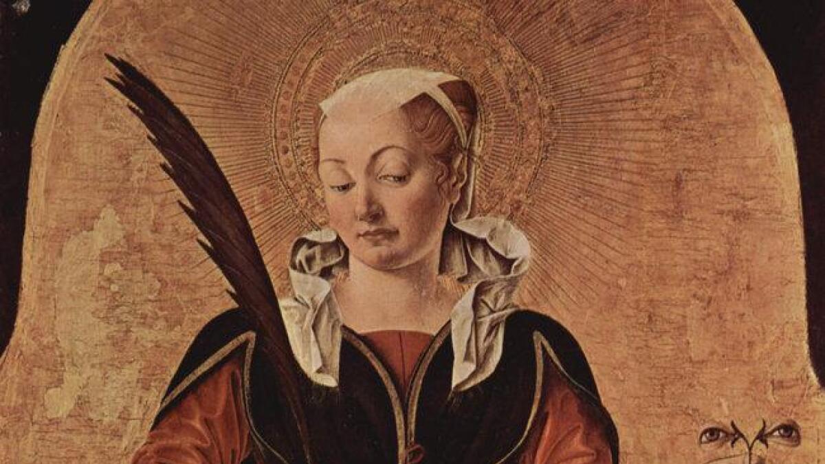 Den heilage Lucia eller sankt Lucia, ofte kalla Santa Lucia (283 -304). født i Siracusa på Sicilia, var ein ung, rik kristen martyr som vart helgenerklært. (Oljemåleri frå 1473 av Francesco del Cossa.)