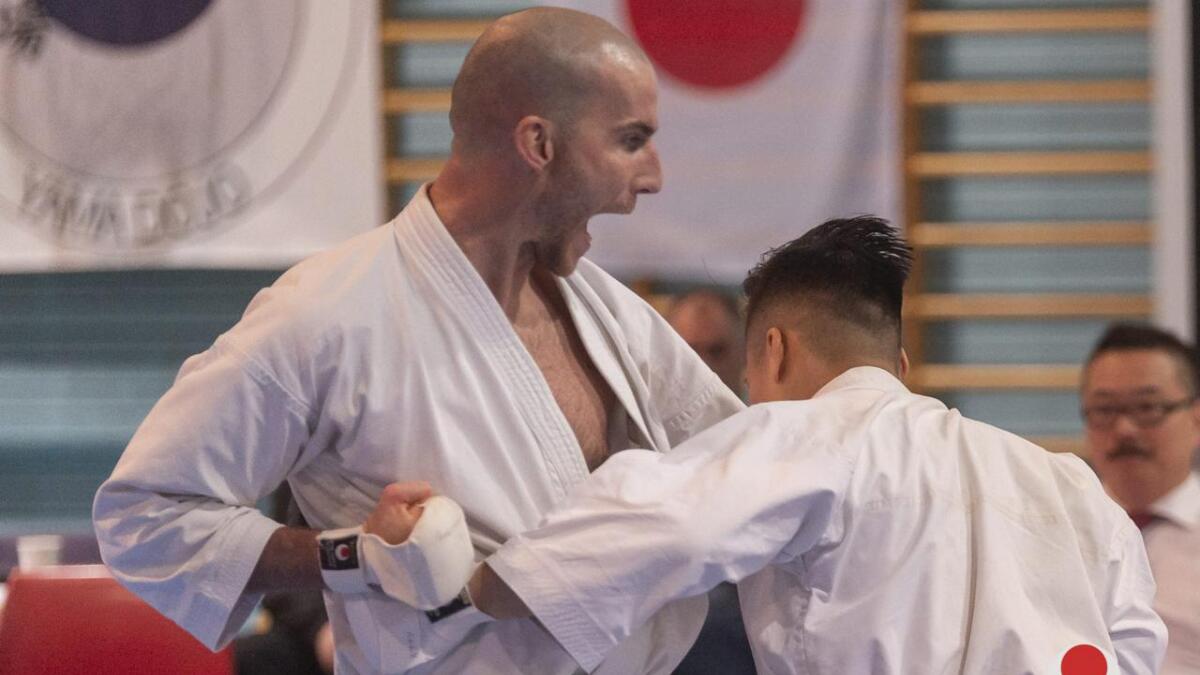 Hans André Skåtun (t.v.)  vart kåra til årets mannlege utøvar under NM i JKA karate.